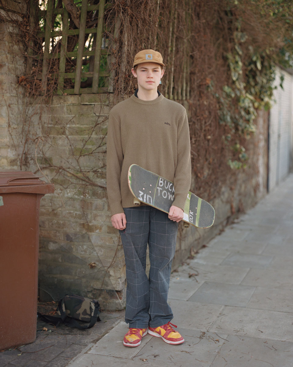 Charlie, a portrait shot centre-frame of a young teenager who, along with his friends, decided to turn an abandoned pub car park into a skatepark when most of them were closed during the pandemic. © Sukhy Hullait, United Kingdom, Winner, Open Competition, Portraiture, 2023 Sony World Photography Awards
