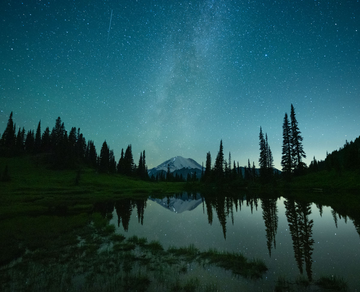 Sometimes a sleepless night is key to great photography. At approximately 3:40 a.m. on a frigid summer morning, photographer W. Kent Williamson snapped this image from Tipsoo Lake in Mount Rainier National Park, Washington. © W. Kent Williamson, Pictures of the Year 2022