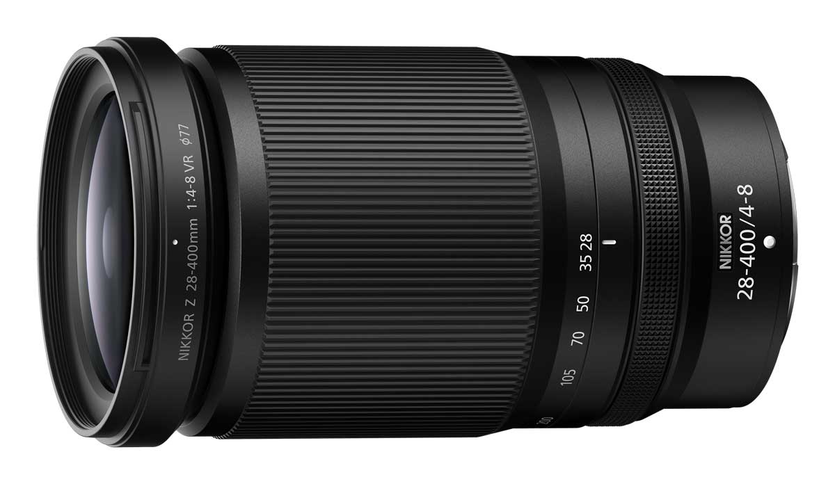 Nikkor Z 28-400mm superzoom lens photographed from the side showing front element