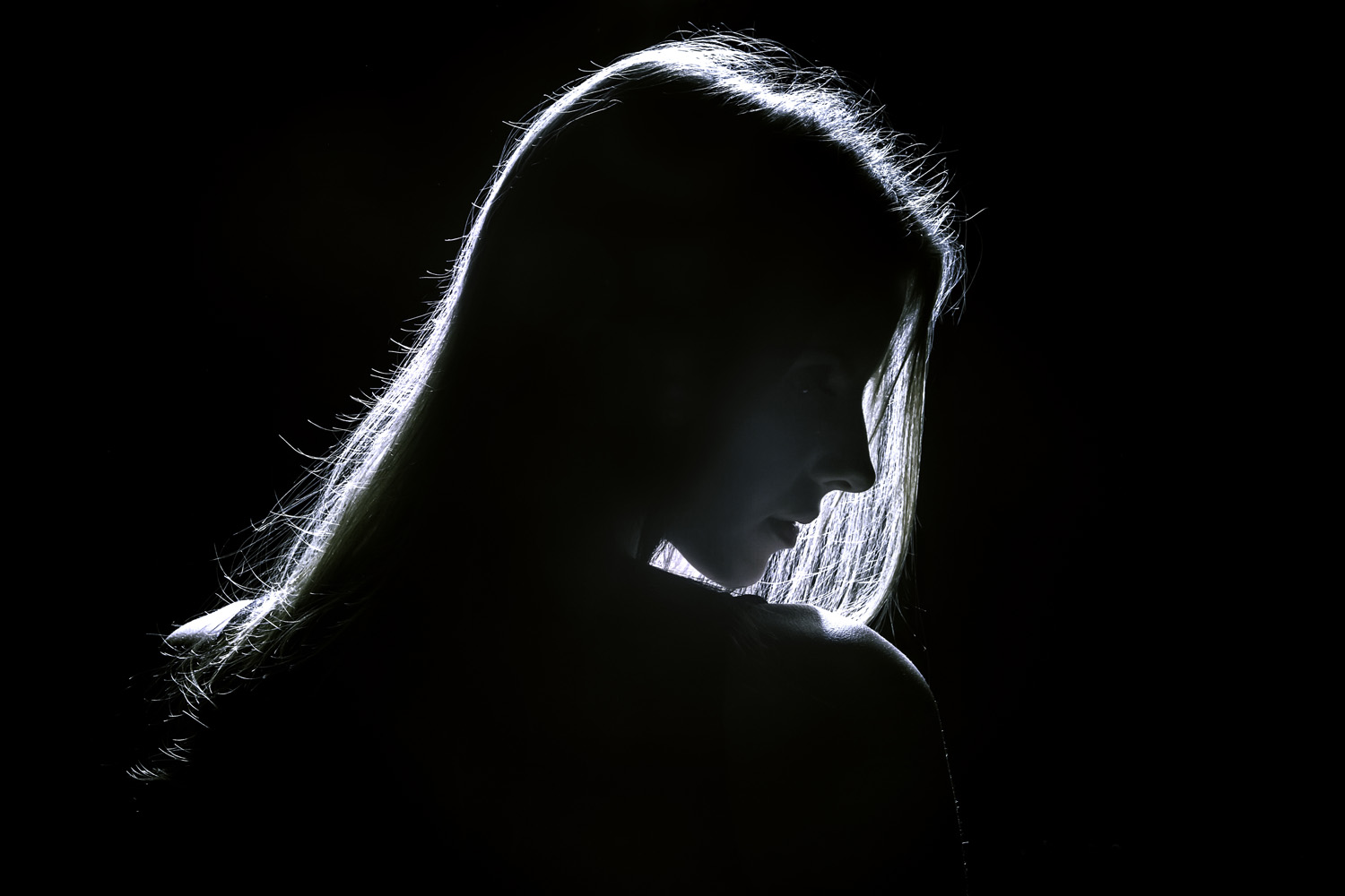 woman profile silhouette in dark